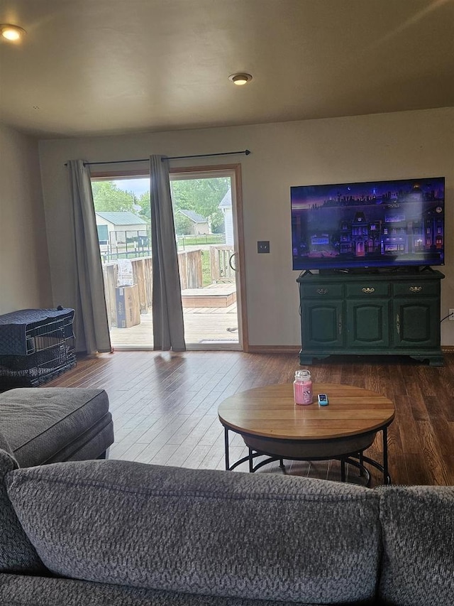 301 Superior St, Boscobel, WI 53805 - living area with dark wood-type flooring, recessed lighting, and baseboards