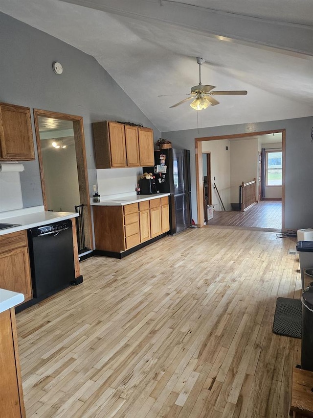 301 Superior St, Boscobel, WI 53805 - kitchen featuring black appliances, lofted ceiling, light wood-style flooring, light countertops, and a ceiling fan