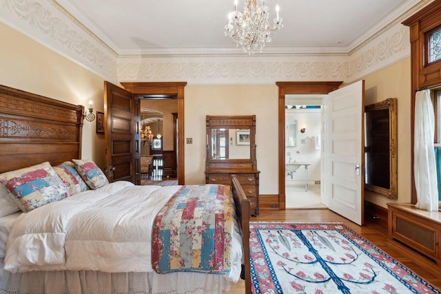 3432 N Lake Dr, Milwaukee, WI 53211 - bedroom featuring wood finished floors, a chandelier, crown molding, and ensuite bathroom