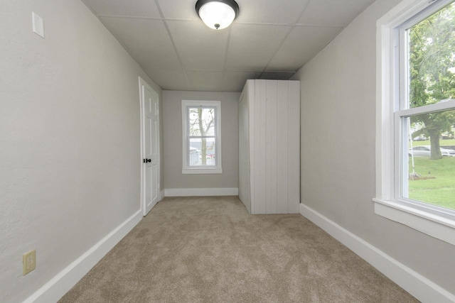244 S Ridge St, Hustisford, WI 53034 - empty room with carpet floors, plenty of natural light, and baseboards