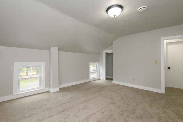 244 S Ridge St, Hustisford, WI 53034 - additional living space featuring lofted ceiling, carpet flooring, and baseboards