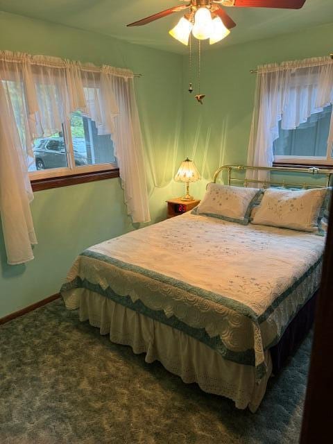 W6782 Marine Dr, Markesan, WI 53946 - carpeted bedroom with ceiling fan and baseboards