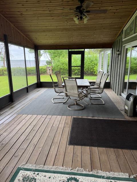 W6782 Marine Dr, Markesan, WI 53946 - sunroom / solarium featuring wooden ceiling, ceiling fan, lofted ceiling, hardwood / wood-style flooring, and a deck