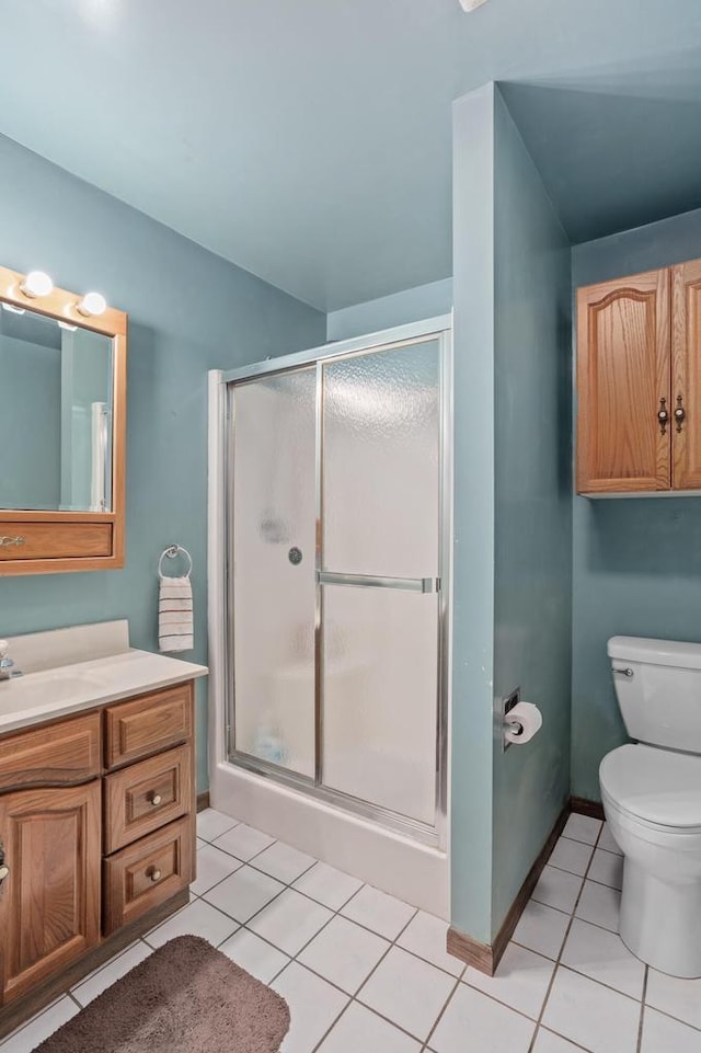 W6782 Marine Dr, Markesan, WI 53946 - full bathroom with tile patterned floors, vanity, a stall shower, and toilet