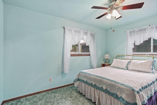 W6782 Marine Dr, Markesan, WI 53946 - bedroom featuring carpet floors, baseboards, and a ceiling fan