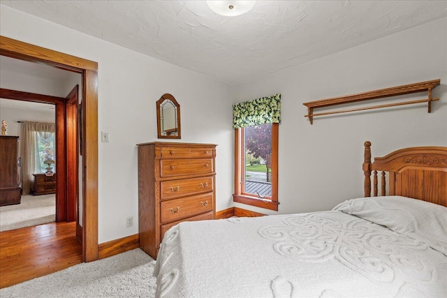 611 Highland Ave, Kewaskum, WI 53040 - carpeted bedroom with baseboards