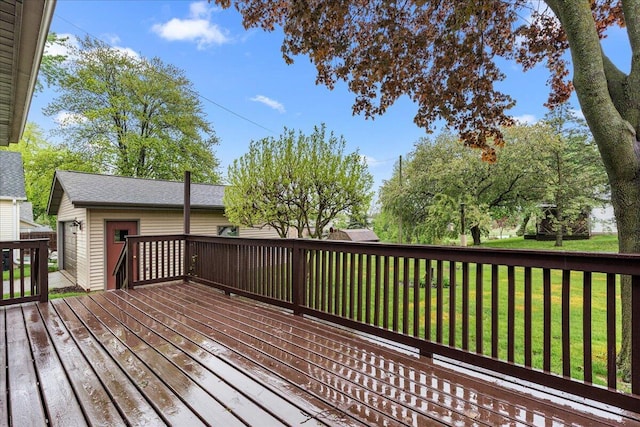 611 Highland Ave, Kewaskum, WI 53040 - wooden terrace with a lawn and an outdoor structure