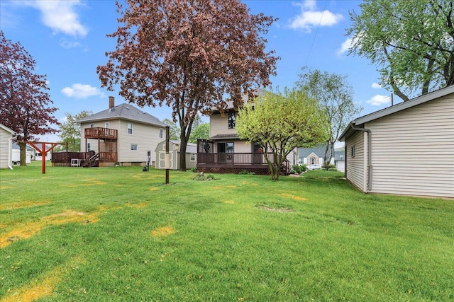 611 Highland Ave, Kewaskum, WI 53040 - view of grassy yard with a deck