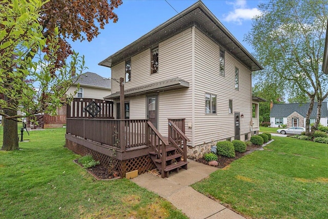 611 Highland Ave, Kewaskum, WI 53040 - back of property featuring a yard and a deck