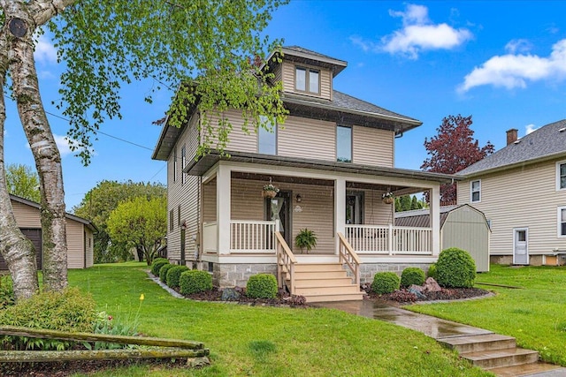 611 Highland Ave, Kewaskum, WI 53040 - traditional style home with a porch and a front yard