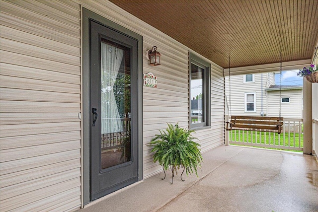 611 Highland Ave, Kewaskum, WI 53040 - view of exterior entry with covered porch