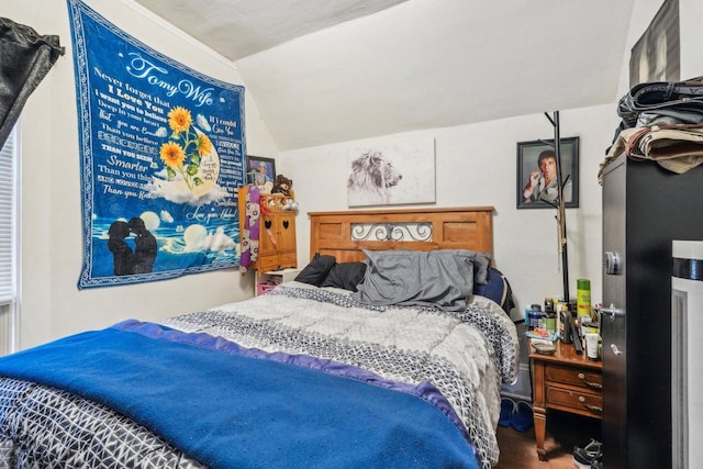 2202 N 55th St, Milwaukee, WI 53208 - bedroom featuring vaulted ceiling and wood finished floors
