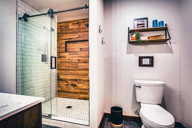 12711 Wind Point Rd, Manitowish Waters, WI 54545 - bathroom featuring a stall shower, toilet, and vanity
