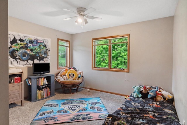 405 August Hills Dr, La Crescent, MN 55947 - carpeted bedroom featuring baseboards and a ceiling fan