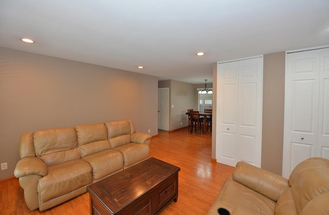 12100 44th Ave, Pleasant Prairie, WI 53158 - living area with light wood-style floors, a chandelier, and recessed lighting