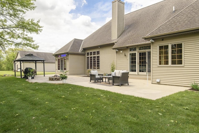 W360S9910 Markham Rd, Eagle, WI 53119 - back of house with a gazebo, a yard, a patio area, a chimney, and a shingled roof