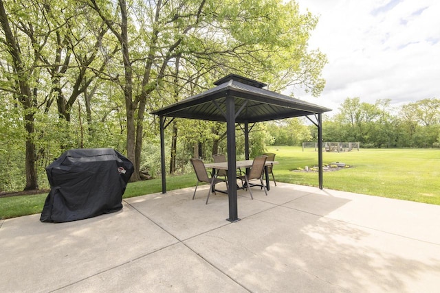 W360S9910 Markham Rd, Eagle, WI 53119 - view of patio / terrace featuring outdoor dining area, a gazebo, and a grill