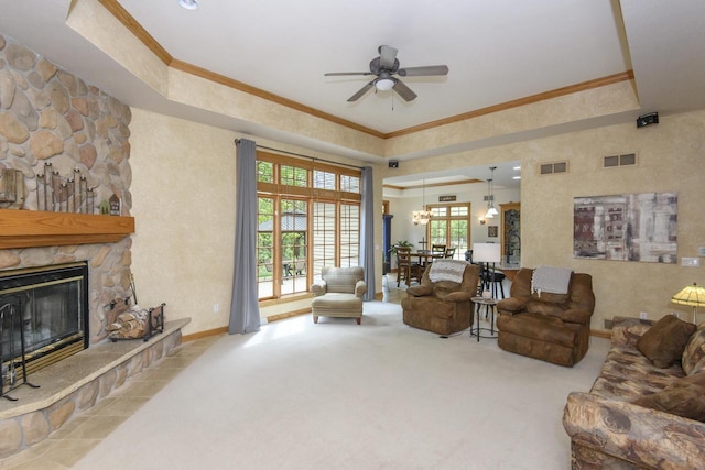 W360S9910 Markham Rd, Eagle, WI 53119 - living room featuring carpet flooring, ceiling fan, crown molding, baseboards, and a fireplace