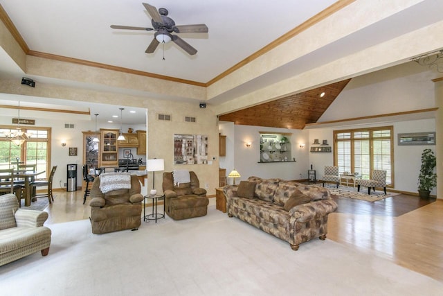 W360S9910 Markham Rd, Eagle, WI 53119 - living area featuring high vaulted ceiling, ceiling fan, wood finished floors, and baseboards