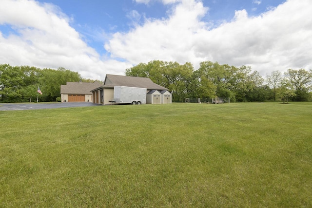 W360S9910 Markham Rd, Eagle, WI 53119 - view of grassy yard with driveway
