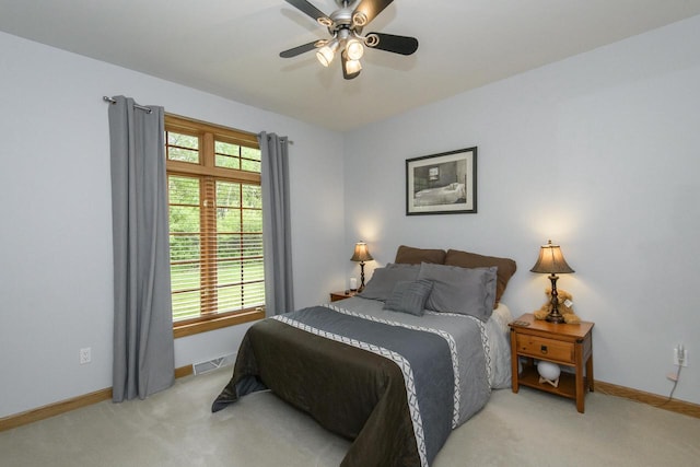W360S9910 Markham Rd, Eagle, WI 53119 - carpeted bedroom with baseboards and ceiling fan