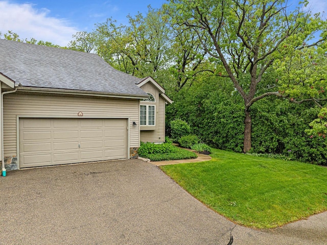 500 S Edwards Blvd Unit 1, Lake Geneva, WI 53147 - garage featuring asphalt driveway
