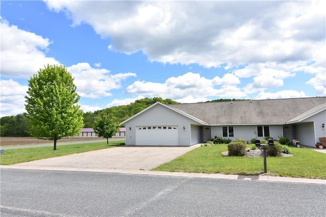 101 Baileyville Ct, Knapp, WI 54749 - ranch-style house with a garage, a front yard, and asphalt driveway