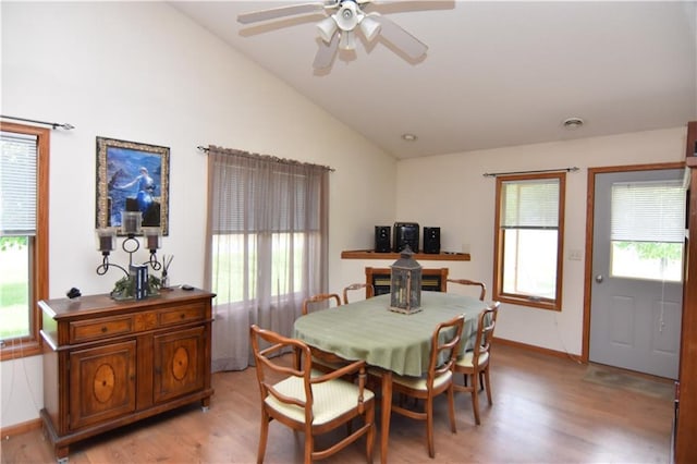 101 Baileyville Ct, Knapp, WI 54749 - dining area featuring vaulted ceiling, light wood finished floors, healthy amount of natural light, and ceiling fan