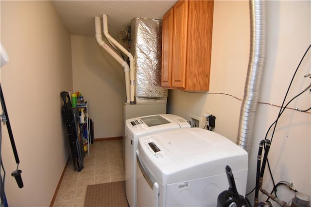 101 Baileyville Ct, Knapp, WI 54749 - washroom featuring independent washer and dryer, cabinet space, and baseboards