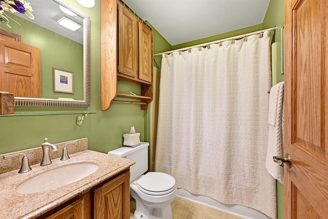 2511 S Natures Ridge Rd, Beloit, WI 53511 - full bath featuring toilet, vanity, tile patterned flooring, and shower / bath combination with curtain