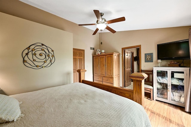 2511 S Natures Ridge Rd, Beloit, WI 53511 - bedroom featuring light wood finished floors, lofted ceiling, and ceiling fan