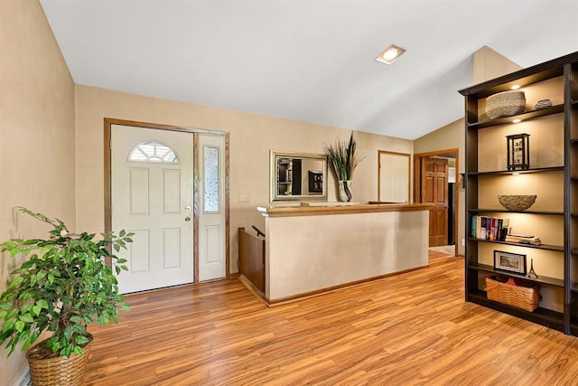 2511 S Natures Ridge Rd, Beloit, WI 53511 - foyer with light wood-type flooring and vaulted ceiling