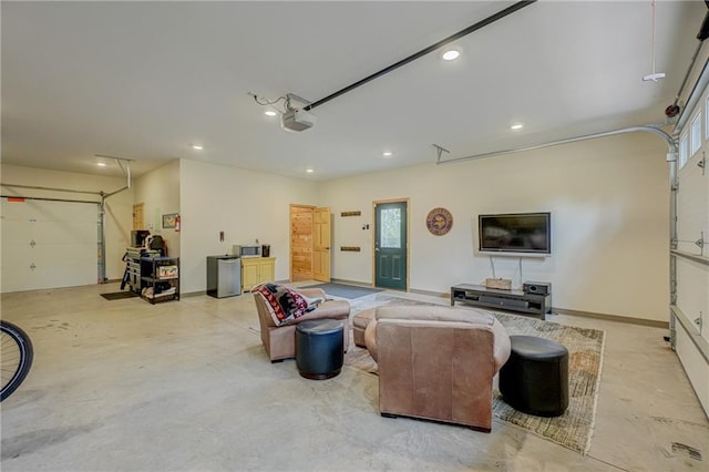 3844 State Road 77, Danbury, WI 54830 - living room featuring a garage, concrete flooring, and recessed lighting