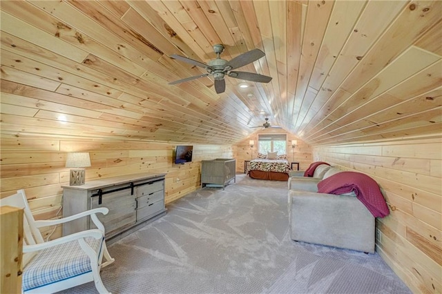 3844 State Road 77, Danbury, WI 54830 - bedroom with wood walls, lofted ceiling, wooden ceiling, carpet floors, and ceiling fan