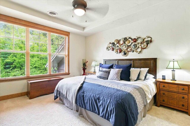441 Clara Ave Unit 115, Wisconsin Dells, WI 53965 - bedroom featuring light colored carpet, baseboards, and ceiling fan