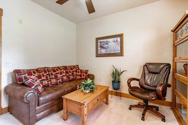 441 Clara Ave Unit 115, Wisconsin Dells, WI 53965 - living room with a ceiling fan, carpet, and baseboards