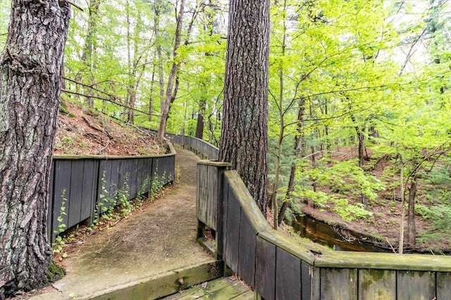 441 Clara Ave Unit 115, Wisconsin Dells, WI 53965 - view of yard with a forest view