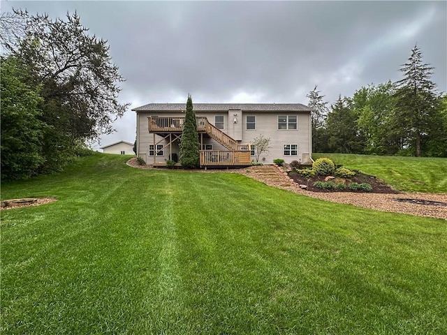 N1816 950th St, Eau Claire, WI 54701 - back of house featuring stairway, a deck, and a lawn