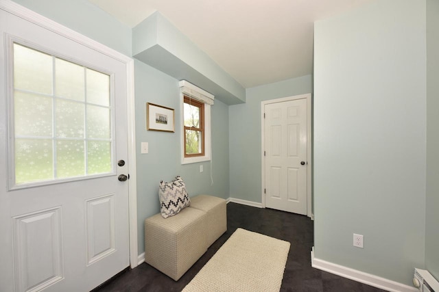 1429 W River Oaks Ln, Mequon, WI 53092 - doorway to outside featuring baseboards and baseboard heating