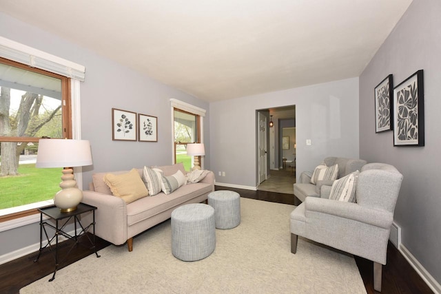 1429 W River Oaks Ln, Mequon, WI 53092 - living area featuring wood finished floors and baseboards