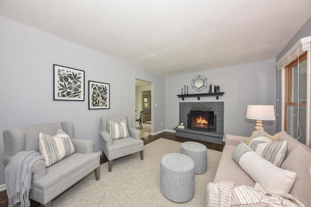 1429 W River Oaks Ln, Mequon, WI 53092 - living room featuring a fireplace and wood finished floors