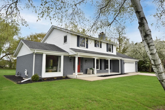 1429 W River Oaks Ln, Mequon, WI 53092 - rear view of property featuring a porch, a chimney, driveway, a garage, and a lawn
