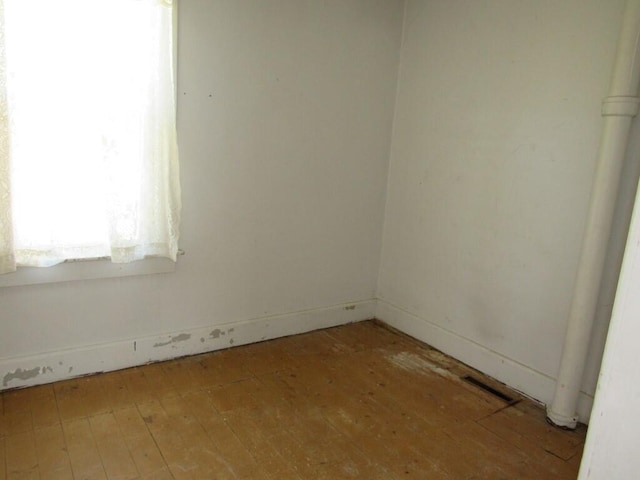 2022 N 20th St, Sheboygan, WI 53081 - empty room with light wood finished floors and baseboards