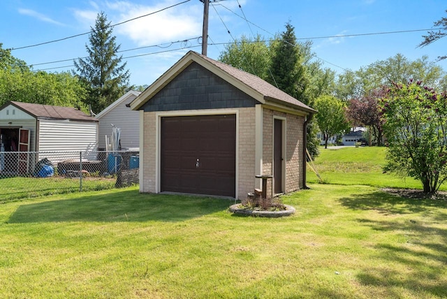 2109 Salisbury Rd, West Bend, WI 53090 - detached garage featuring driveway