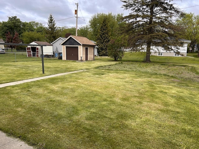 2109 Salisbury Rd, West Bend, WI 53090 - view of yard with a garage and an outdoor structure