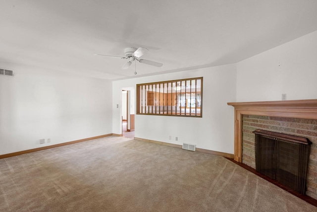 2109 Salisbury Rd, West Bend, WI 53090 - unfurnished living room with carpet floors, a ceiling fan, and baseboards