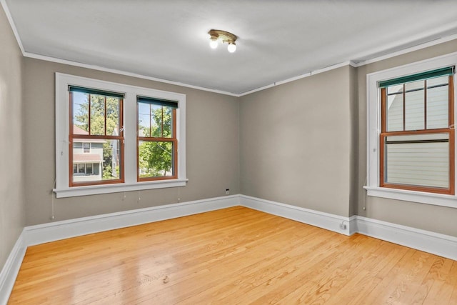 644 Crandall St, Madison, WI 53711 - empty room with crown molding, wood finished floors, and baseboards
