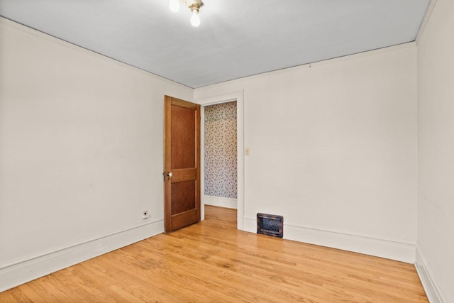 644 Crandall St, Madison, WI 53711 - empty room with wood finished floors and baseboards