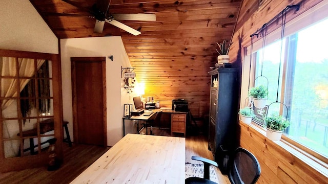 610 Fox Ridge Ct, Nekoosa, WI 54457 - office area featuring wooden walls, plenty of natural light, dark wood-style flooring, ceiling fan, and lofted ceiling