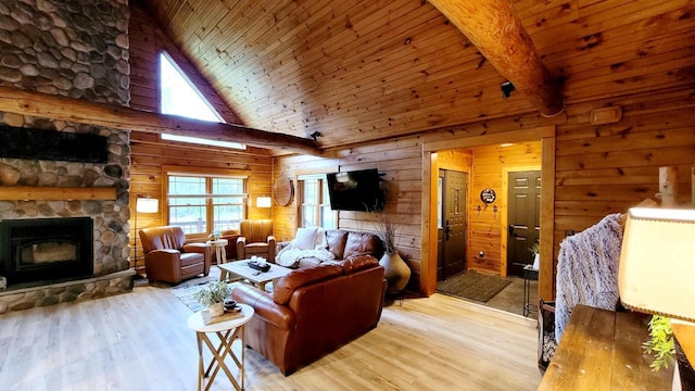 610 Fox Ridge Ct, Nekoosa, WI 54457 - living room featuring wooden walls, light wood-style flooring, a fireplace, high vaulted ceiling, and a wooden ceiling with exposed beams